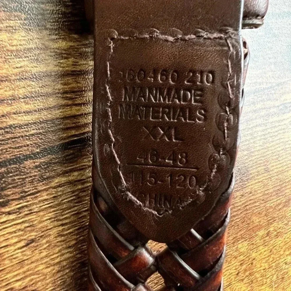 Mens brown woven belt with silver buckle